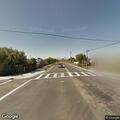 Car doing donuts near bicyclist in San Lorenzo