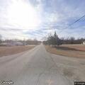 Suspicious person wearing mask near intersection