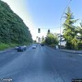 Man walking in traffic on South Schuster Parkway