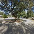 Person lying on ground at Tampa Auto School; no emergency