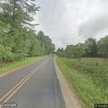 Injured deer near roadway on River Drive