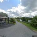 Man lying in roadway after getting off bicycle