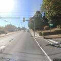 Motorcycle with no license plate towed at intersection