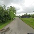 Tree limbs sparking on power line in Angleton