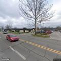 Vehicle hits bank building then leaves the scene