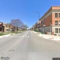 Person acting erratically walking in street at 25th and Austin