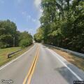 Officer filing follow-up report on prior crash