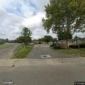 Motorcycle speeding in apartment parking lot