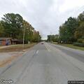 Car hits stop sign on Veterans Drive at Weakley