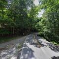 Car parts scattered on road near local church
