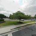Parking citation issued for blue Nissan sedan
