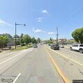 Vehicle stopped in traffic lane on Northeast Fourth