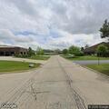 Suspicious woman going door to door on Sherman Rd