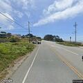 Crane on truck blocking Highway 1 lanes in Montara