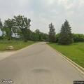 Officer checks on man sitting in roadside ditch
