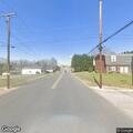 Man knocking on doors in Landis neighborhood