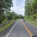 Trailer separates from pickup and goes down embankment