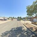 Person experiencing abdominal pain at Lynn Drive