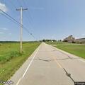 License plate creating hazard on 160th Avenue