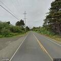 Pickup stopped with person walking in roadway