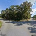 Tree fire near transformer at trailer park entrance
