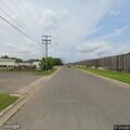 Suspicious rider circling on small bike with headlight