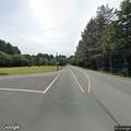 Dog running in roadway near Highway 101 and Sunset