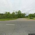 Car crashes into ditch in front of gas station
