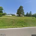Car in ditch after swerving to miss deer