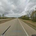 Car stuck on debris on Highway 64 near Vilonia