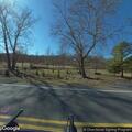 Speeding cars pass over double yellow on Winchester Road