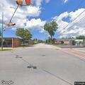 Downed utility line reported behind business