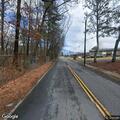 Tree and wires block Curtis Drive roadway