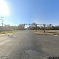 Car hits deer and blocks intersection roadway