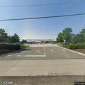 Person having a seizure at airport parking area