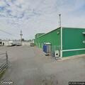 Video alarm shows person entering vehicle on lot