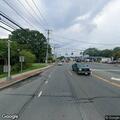 Vehicle and bicyclist crash in Centereach lot