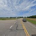 Hay bales blocking traffic at highway intersection