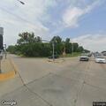 Woman talking to herself in median near South Stoughton Rd