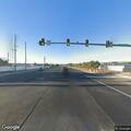 Officers check vehicles near liquor store on 32 Road