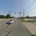 Person laid out at bus shelter in Michigan City