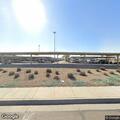 Person with backpack on construction site property