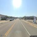 Agitated person yelling in street near Conoco