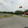 Car in ditch near Ardmore Highway intersection