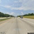 Car with flat tire on I-85 right shoulder
