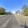 Officer checks red pickup on North Alvin Street