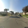 Person looking into mailboxes on West Delta Avenue