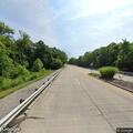 Swerving tractor-trailer and dump truck on I-64
