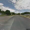 Officer stops pickup truck near business