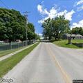 Person with low blood sugar barely responding on Lucas Street
